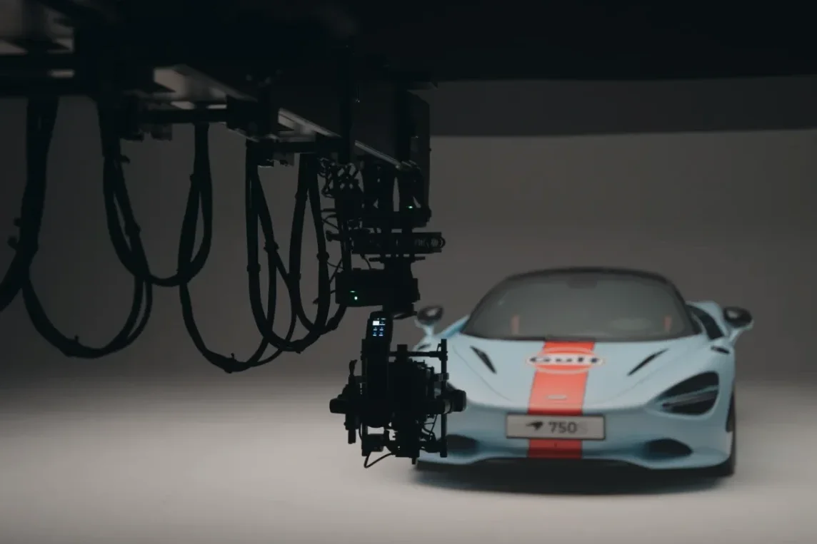 McLaren 750S in Gulf livery on a studio cyclorama, shot head on under a motion control rig
